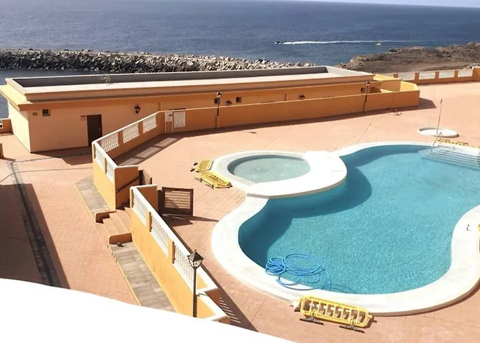Con Piscina Playa Roja, شقة *